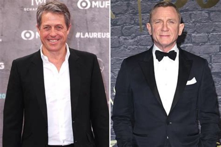 
Hugh Grant Jokes He’s ‘Married to James Bond’ in ‘Glass Onion’ 