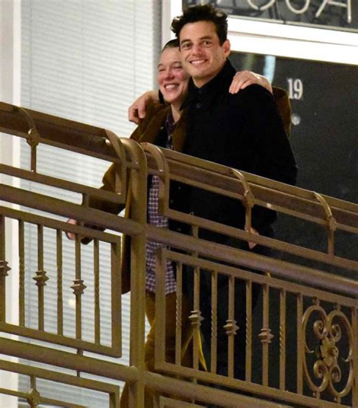 Rami Malek and Léa Seydoux Smile as They Walk with Their Arms Around Each Other